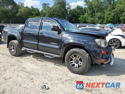 Czwarte zdjęcie samochodu z boku: 2014 TOYOTA TACOMA DOUBLE CAB VIN:5TFLU4EN7EX093921 - miniatura