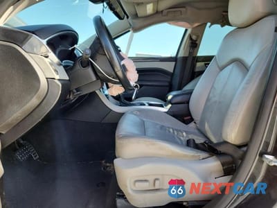 Zdjęcie 7 z 12 samochodu: 2015 CADILLAC SRX VIN:3GYFNAE32FS548176 - miniatura