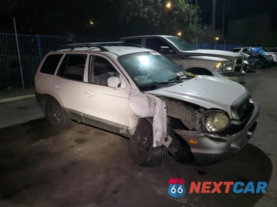Czwarte zdjęcie samochodu z boku: 2002 HYUNDAI SANTA FE GLS VIN:KM8SC13D22U212989 - miniatura
