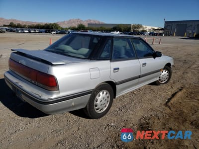 Trzecie zdjęcie samochodu z tyłu: 1993 SUBARU LEGACY L VIN:4S3BC6333P9654859 - miniatura