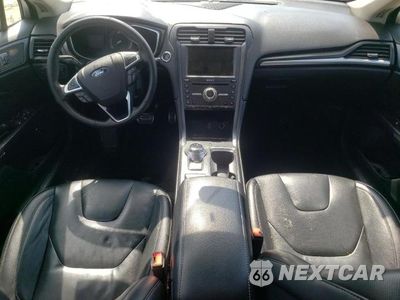 Zdjęcie 8 z 12 samochodu: 2017 FORD FUSION TITANIUM HEV VIN:3FA6P0RU7HR232575 - miniatura