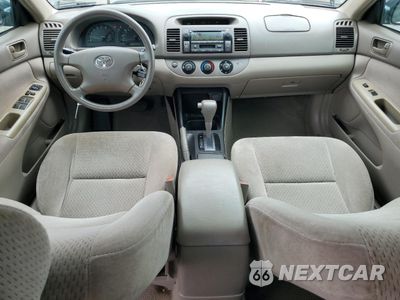 Zdjęcie 8 z 14 samochodu: 2002 TOYOTA CAMRY LE VIN:4T1BF30KX2U526217 - miniatura