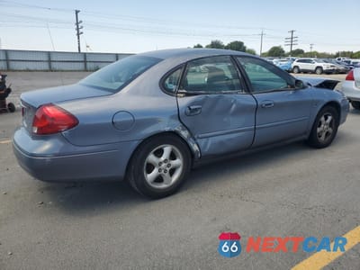 Trzecie zdjęcie samochodu z tyłu: 2000 FORD TAURUS SES VIN:1FAFP5524YG152806 - miniatura