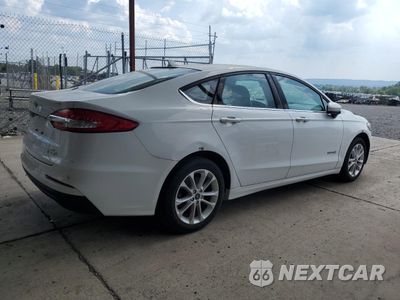 Trzecie zdjęcie samochodu z tyłu: 2019 FORD FUSION SE VIN:3FA6P0LU1KR265538 - miniatura
