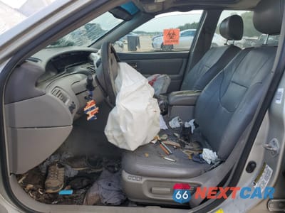 Zdjęcie 7 z 13 samochodu: 2001 TOYOTA AVALON XL VIN:4T1BF28B34U386948 - miniatura