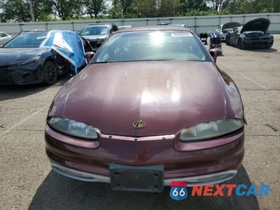 Piąte zdjęcie samochodu w środku: 1999 OLDSMOBILE AURORA VIN:1G3GR62C0X4117191 - miniatura