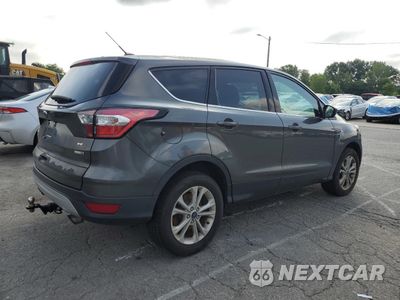 Trzecie zdjęcie samochodu z tyłu: 2017 FORD ESCAPE SE VIN:1FMCU9GD8HUE24427 - miniatura