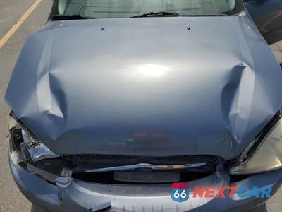 Zdjęcie 11 z 13 samochodu: 2000 FORD TAURUS SES VIN:1FAFP5524YG152806 - miniatura