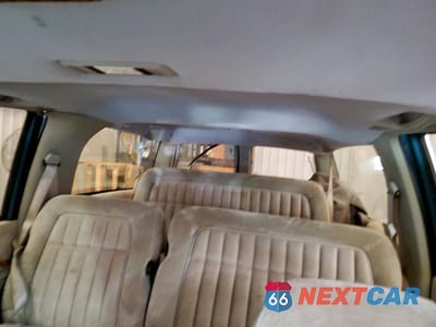 Zdjęcie 10 z 13 samochodu: 1992 CHEVROLET SUBURBAN K1500 VIN:1GNFK16K9NJ338993 - miniatura