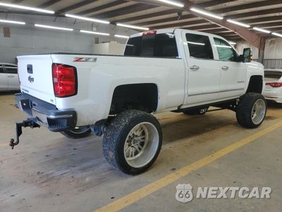 Trzecie zdjęcie samochodu z tyłu: 2016 CHEVROLET SILVERADO K2500 HEAVY DUTY LTZ VIN:1GC1KWEG1GF277514 - miniatura