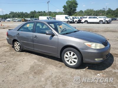 Czwarte zdjęcie samochodu z boku: 2003 TOYOTA CAMRY LE VIN:4T1BE30K53U734560 - miniatura