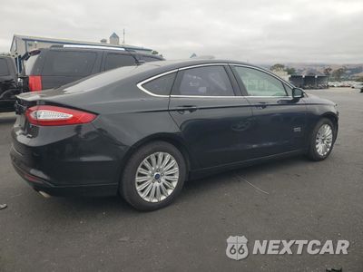 Trzecie zdjęcie samochodu z tyłu: 2015 FORD FUSION SE PHEV VIN:3FA6P0PU1FR284591 - miniatura
