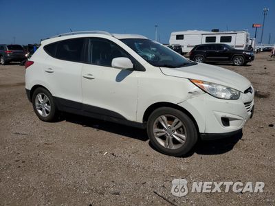 Czwarte zdjęcie samochodu z boku: 2010 HYUNDAI TUCSON GLS VIN:KM8JUCAC9AU021857 - miniatura