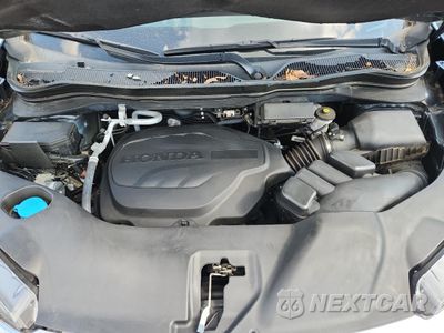 Zdjęcie 12 z 13 samochodu: 2021 HONDA PILOT EXL VIN:5FNYF6H54MB031392 - miniatura