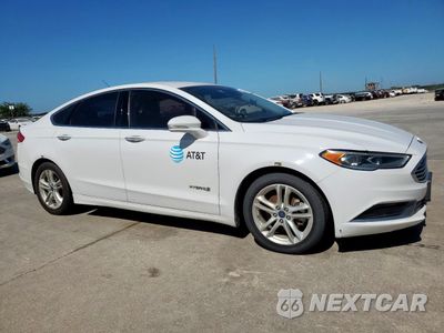 Czwarte zdjęcie samochodu z boku: 2018 FORD FUSION SE HYBRID VIN:3FA6P0LU0JR118657 - miniatura