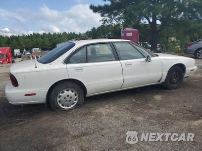 Trzecie zdjęcie samochodu z tyłu: 1999 OLDS 88 VIN:1G3HN52K4X4820021 - miniatura