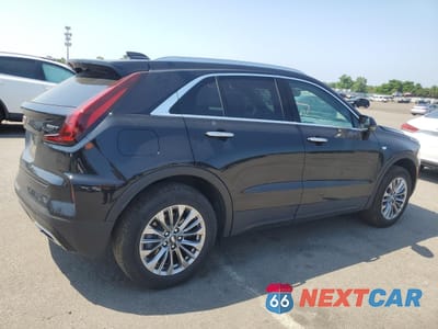Trzecie zdjęcie samochodu z tyłu: 2024 CADILLAC XT4 PREMIUM LUXURY VIN:1GYFZDR41RF184933 - miniatura
