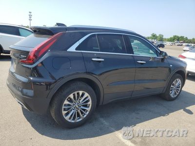 Trzecie zdjęcie samochodu z tyłu: 2024 CADILLAC XT4 PREMIUM LUXURY VIN:1GYFZDR41RF184933 - miniatura