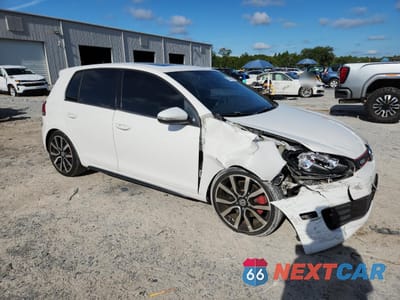 Czwarte zdjęcie samochodu z boku: 2011 VOLKSWAGEN GTI VIN:WVWGV7AJ5BW268624 - miniatura