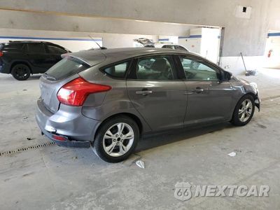 Trzecie zdjęcie samochodu z tyłu: 2014 FORD FOCUS VIN:1FADP3K23EL104877 - miniatura