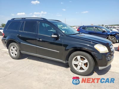 Czwarte zdjęcie samochodu z boku: 2007 MERCEDES-BENZ GL 450 4MATIC VIN:4JGBF71E47A191058 - miniatura