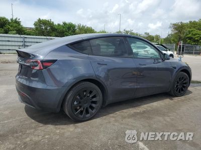 Trzecie zdjęcie samochodu z tyłu: 2023 TESLA MODEL Y VIN:7SAYGDEE3PF842887 - miniatura