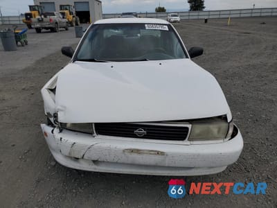 Piąte zdjęcie samochodu w środku: 1994 NISSAN SENTRA E VIN:1N4EB31F2RC877000 - miniatura