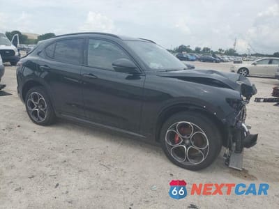 Czwarte zdjęcie samochodu z boku: 2024 ALFA ROMEO STELVIO TI VIN:ZASPAKBN9R7D72979 - miniatura