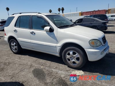 Czwarte zdjęcie samochodu z boku: 2002 MERCEDES-BENZ ML 320 VIN:4JGAB54E92A334814 - miniatura