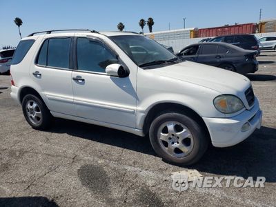 Czwarte zdjęcie samochodu z boku: 2002 MERCEDES-BENZ ML 320 VIN:4JGAB54E92A334814 - miniatura