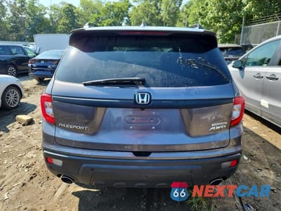 Zdjęcie 6 z 14 samochodu: 2021 HONDA PASSPORT TOURING VIN:5FNYF8H96MB021641 - miniatura
