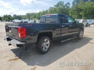 Trzecie zdjęcie samochodu z tyłu: 2018 CHEVROLET SILVERADO K1500 LTZ VIN:1GCVKSEC1JZ102645 - miniatura