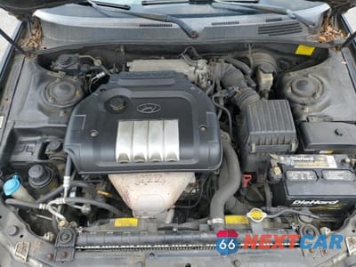 Zdjęcie 11 z 12 samochodu: 2003 HYUNDAI SONATA GL VIN:KMHWF25S03A743833 - miniatura