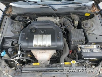 Zdjęcie 11 z 12 samochodu: 2003 HYUNDAI SONATA BASE VIN:KMHWF25S03A743833 - miniatura
