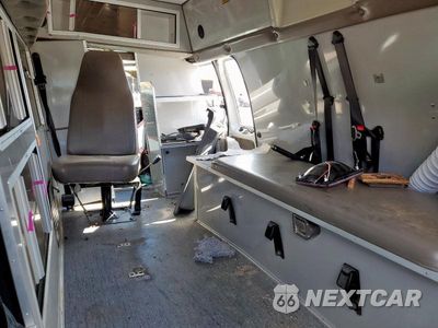 Zdjęcie 10 z 13 samochodu: 2009 FORD ECONOLINE E350 SUPER DUTY VAN VIN:1FDSS34P39DA49920 - miniatura