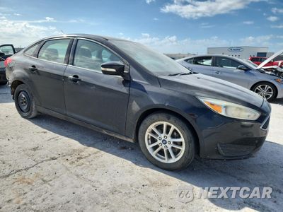 Czwarte zdjęcie samochodu z boku: 2015 FORD FOCUS SE VIN:1FADP3F20FL336753 - miniatura