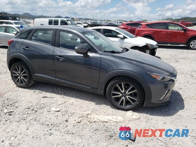 Czwarte zdjęcie samochodu z boku: 2017 MAZDA CX-3 TOURING VIN:JM1DKFC75H0149037 - miniatura