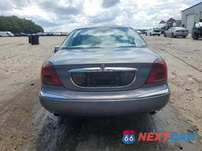 Zdjęcie 6 z 12 samochodu: 1999 LINCOLN CONTINENTAL VIN:1LNHM97V4XY610195 - miniatura
