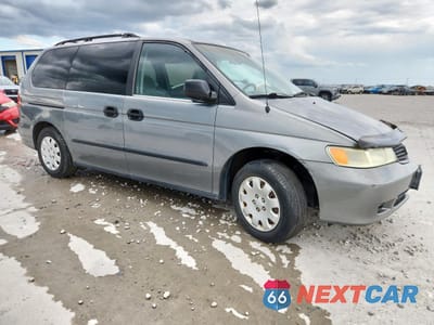 Czwarte zdjęcie samochodu z boku: 2001 HONDA ODYSSEY LX VIN:2HKRL185X1H563131 - miniatura