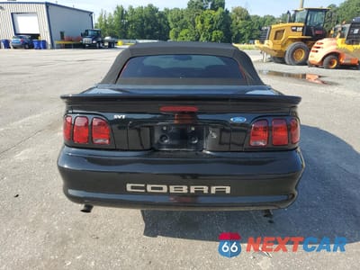 Zdjęcie 6 z 14 samochodu: 1996 FORD MUSTANG COBRA VIN:1FALP46V2TF190068 - miniatura