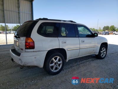 Trzecie zdjęcie samochodu z tyłu: 2007 GMC ENVOY VIN:1GKDS13S372245876 - miniatura