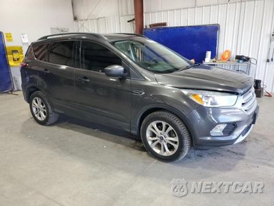 Czwarte zdjęcie samochodu z boku: 2018 FORD ESCAPE SE VIN:1FMCU0GD6JUC62427 - miniatura
