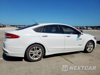 Trzecie zdjęcie samochodu z tyłu: 2018 FORD FUSION SE HYBRID VIN:3FA6P0LU0JR118657 - miniatura
