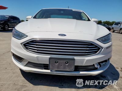 Piąte zdjęcie samochodu w środku: 2018 FORD FUSION SE HYBRID VIN:3FA6P0LU7JR118588 - miniatura