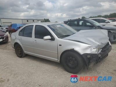 Czwarte zdjęcie samochodu z boku: 1999 VOLKSWAGEN JETTA GLS TDI VIN:3VWSF29MXXM077133 - miniatura