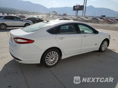 Trzecie zdjęcie samochodu z tyłu: 2014 FORD FUSION SE PHEV VIN:3FA6P0PU7ER397718 - miniatura