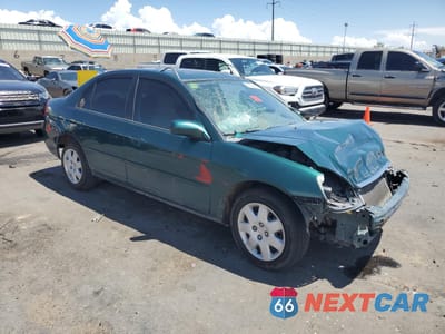 Czwarte zdjęcie samochodu z boku: 2001 HONDA CIVIC EX VIN:1HGES26721L016945 - miniatura