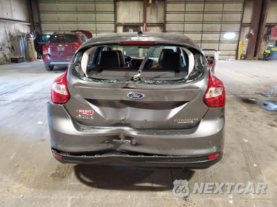 Zdjęcie 6 z 12 samochodu: 2013 FORD FOCUS TITANIUM VIN:1FADP3N24DL156545 - miniatura