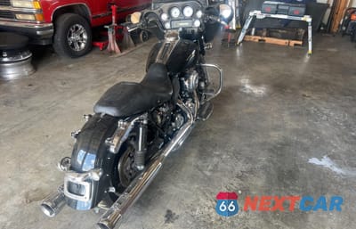Czwarte zdjęcie samochodu z boku: 2011 HARLEY-DAVIDSON FLHX VIN:1HD1KBM14BB659525 - miniatura