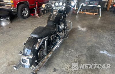 Czwarte zdjęcie samochodu z boku: 2011 HARLEY-DAVIDSON FLHX VIN:1HD1KBM14BB659525 - miniatura